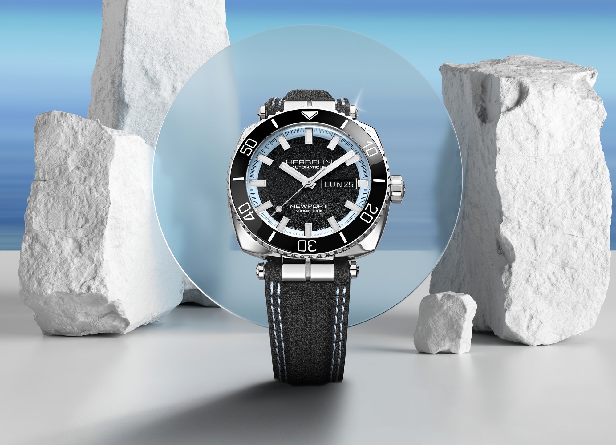 HERBELIN Newport Diver Taucheruhr mit schwarzem Zifferblatt zwischen weißen Steinen